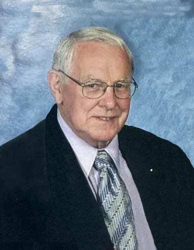 Charles E. “Chuck” Lind